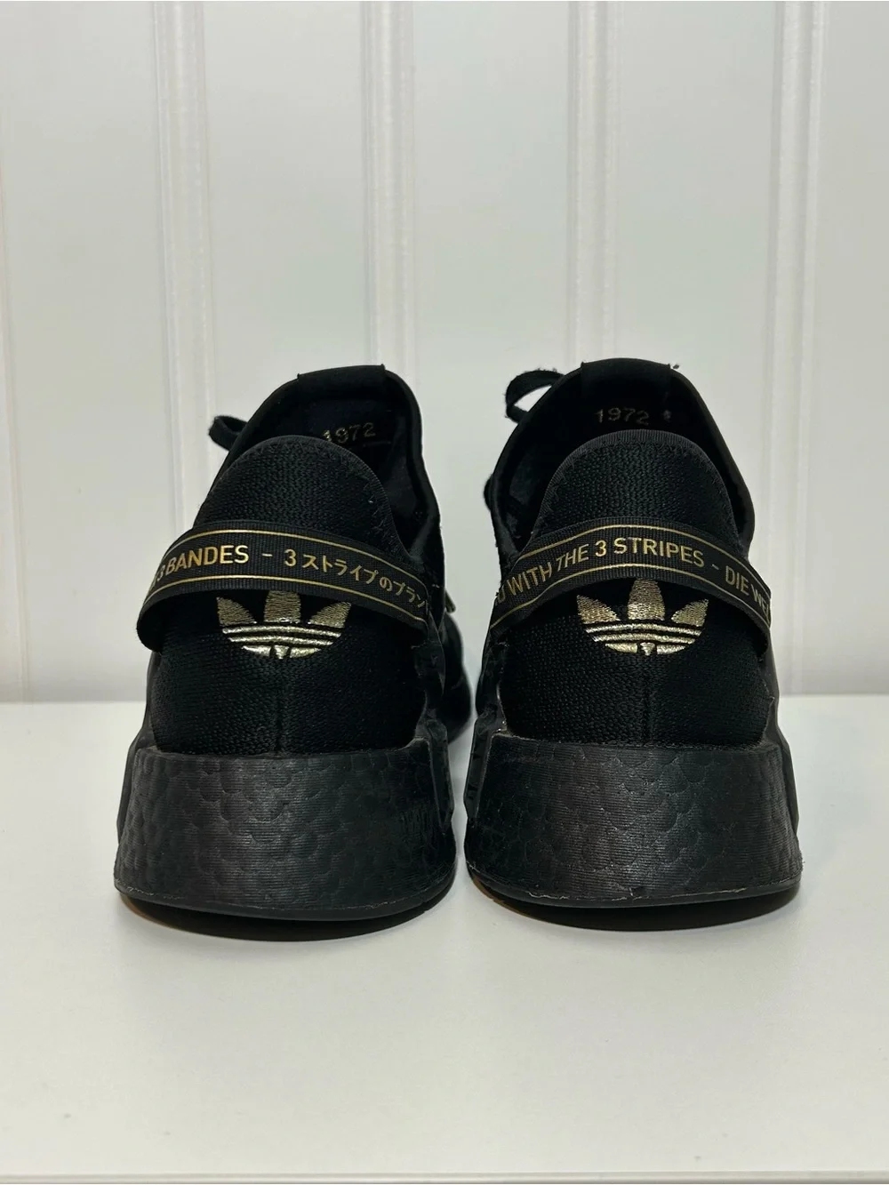 adidas nmd Black Sneakers with Gold Accents